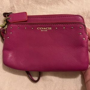 Pink Coach leather wristlet/wallet. Great condition. No visible signs of wear.
